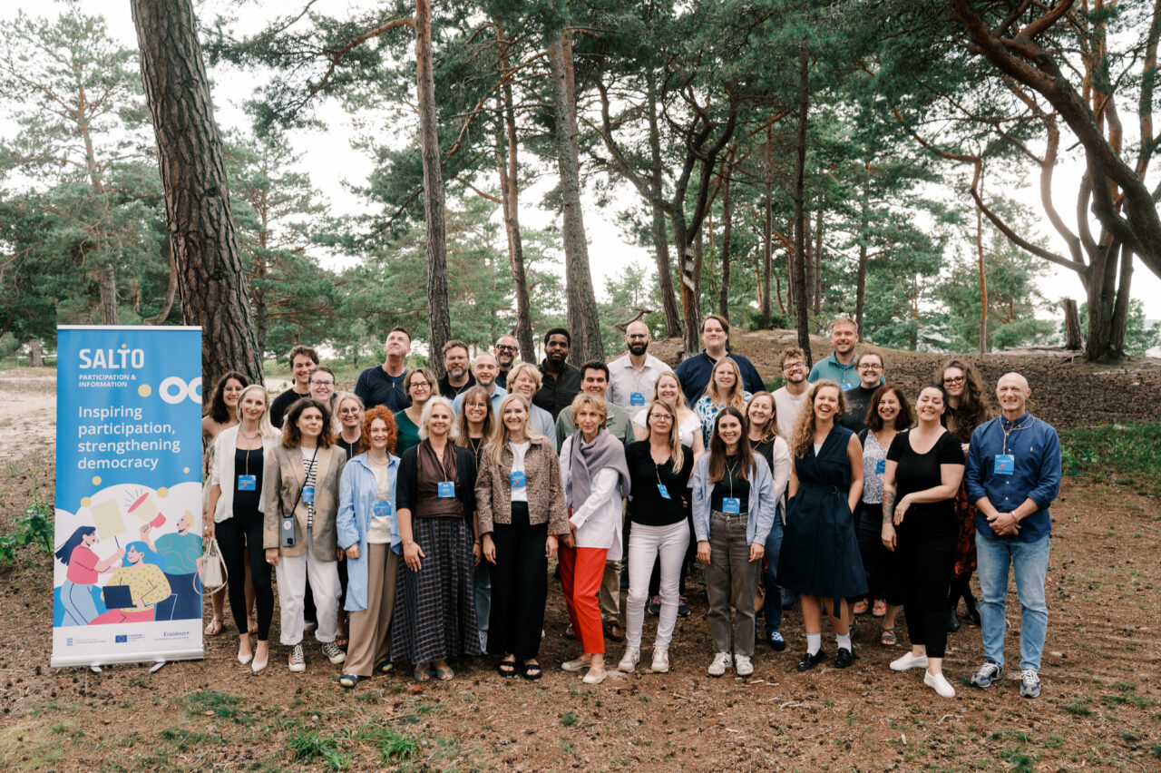 Group photo of people smiling
