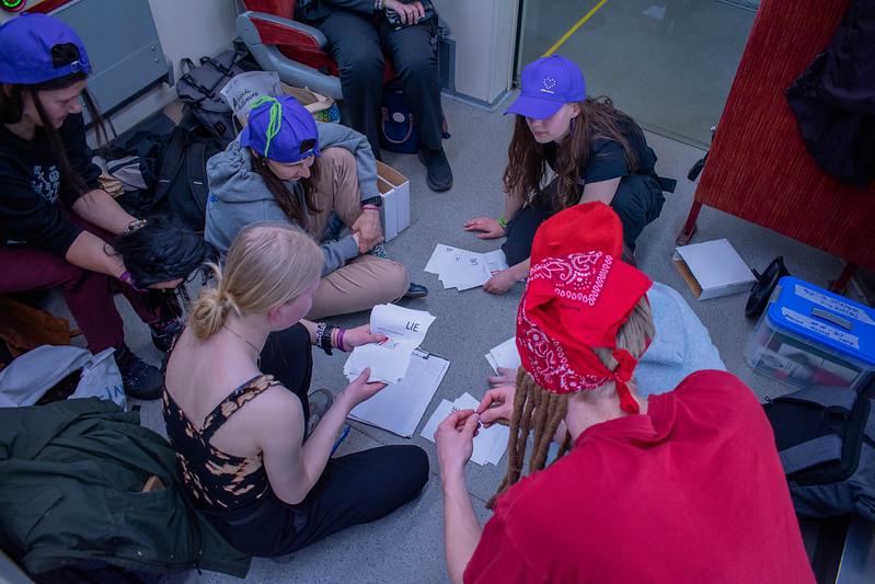 People doing group work on the floor